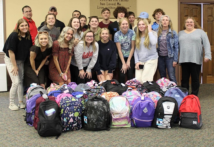 group_with_donation_backpacks